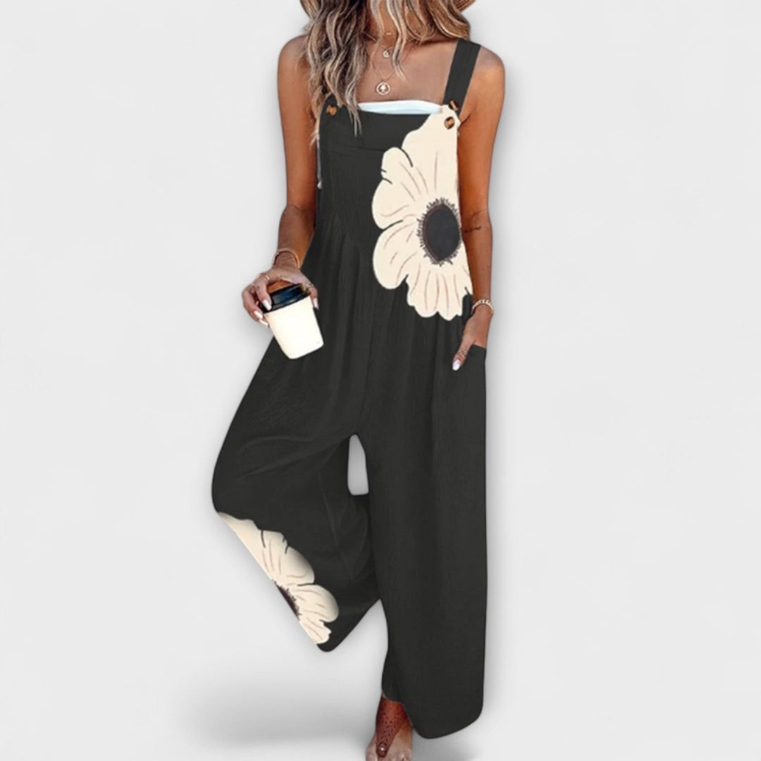 Sarah | Schwarze Latzhose mit grosen Blumenmotiven